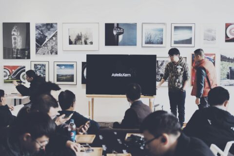 group of people in art exhibit